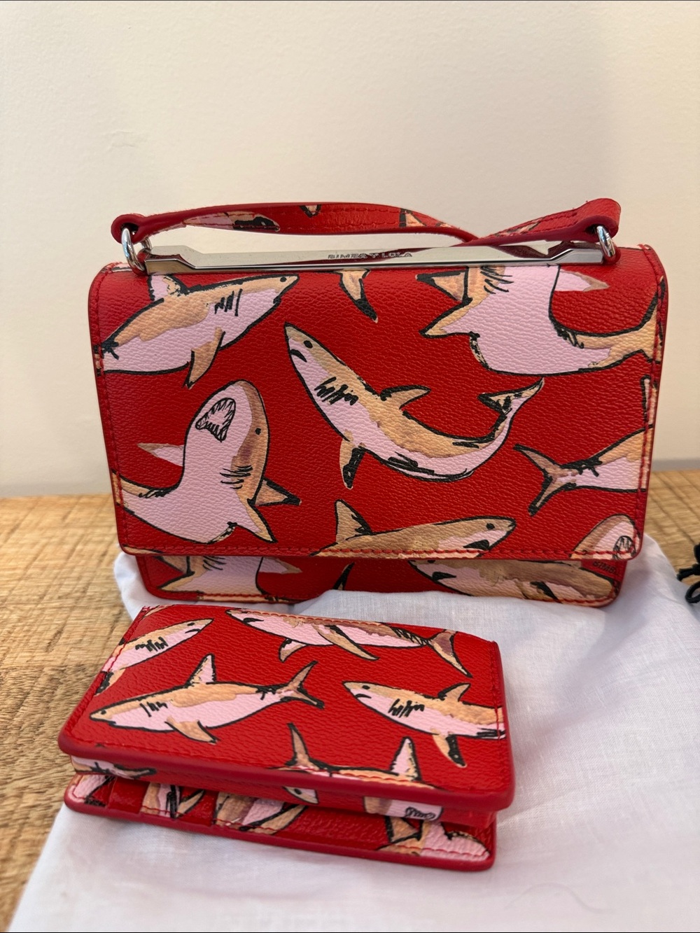 Bimba Y Lola Red Shark Print card purse and matching key holder set